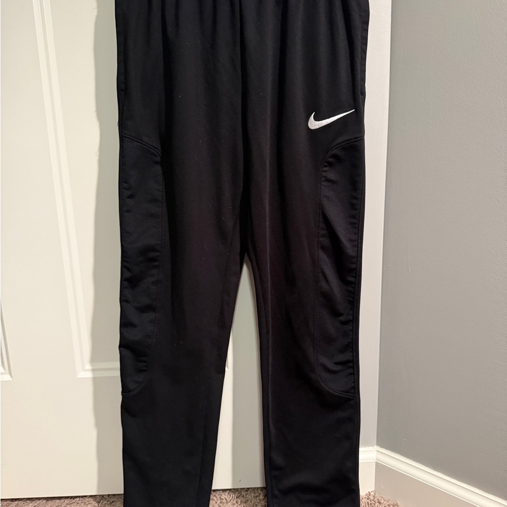 Nike Kids Black Sweatpants with White Swoosh